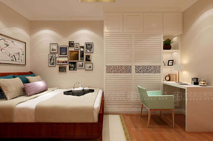 客卧墙体采用浅咖色乳胶漆进行装饰，衣柜与书桌书架的一体设计使整个空间的功能齐全，用装饰画进行点缀装饰，丰富了整个空间。